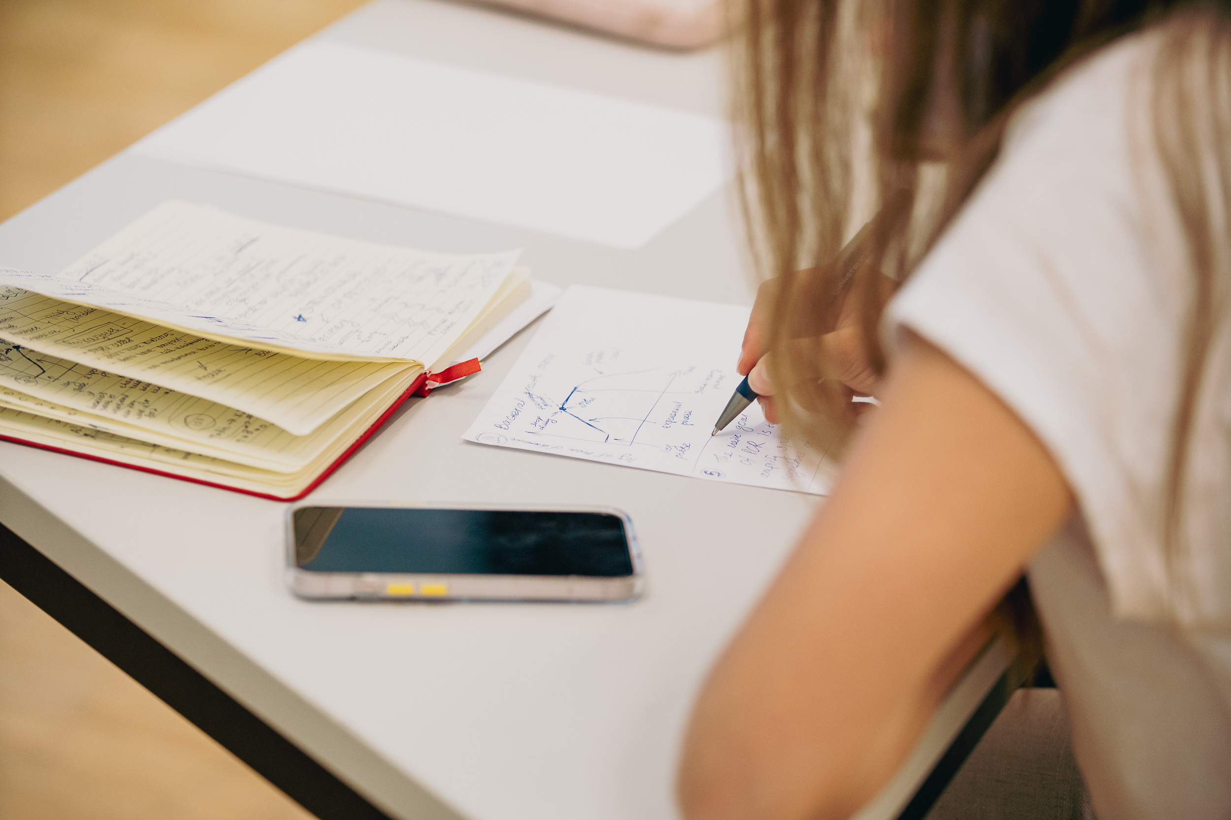 Student working on a notepad